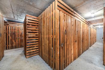 A room with wooden walls and a concrete floor.